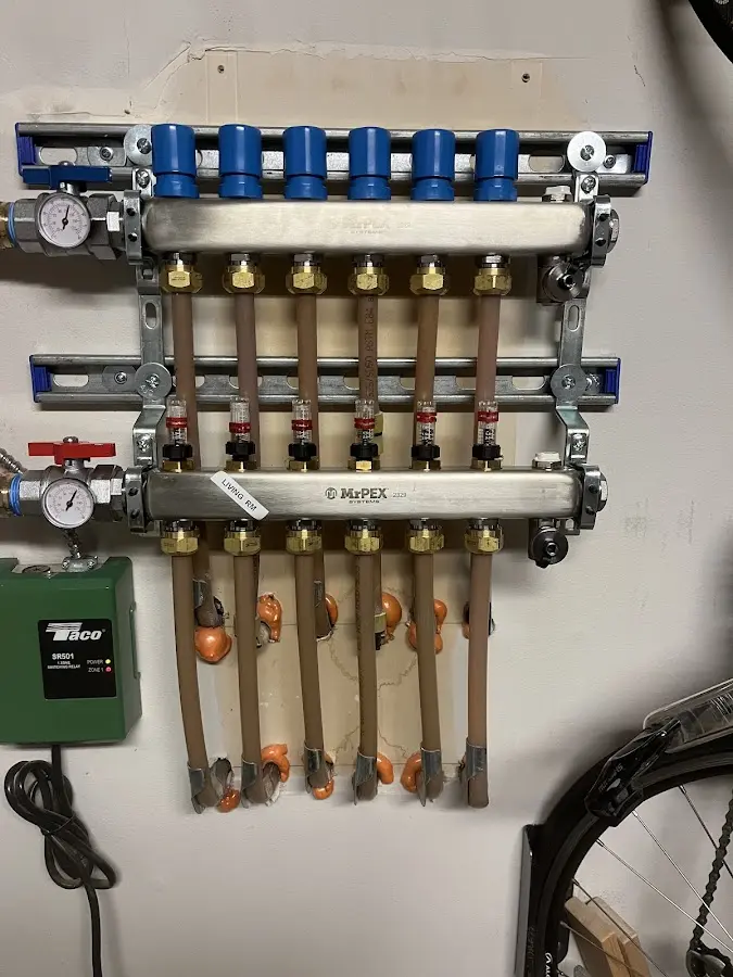 Plumber performing Water Heater Repair at a residential property in Dunlap